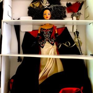 Never removed from box. Harlequin mask with feathers an Swarovski crystals